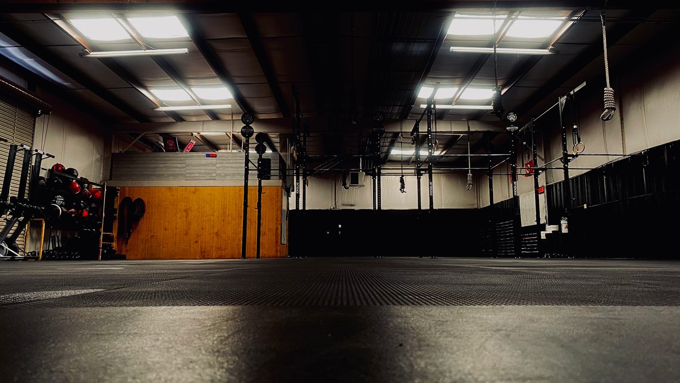 Inside Osos Negros Gym — the training floor and rig